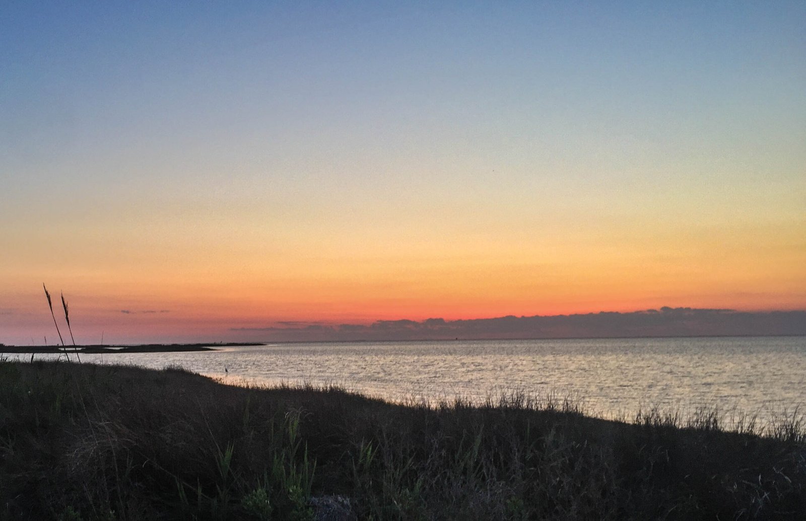 Sunset over the water at Cape Hatteras National Seashore near Camp Hatteras RV Resort