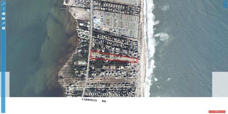 Aerial view of Ocean Waves Campground, an RV park on Island Pines Drive at 25313 NC Highway 12 in Waves, North Carolina, between the Atlantic Ocean and Pamlico Sound.